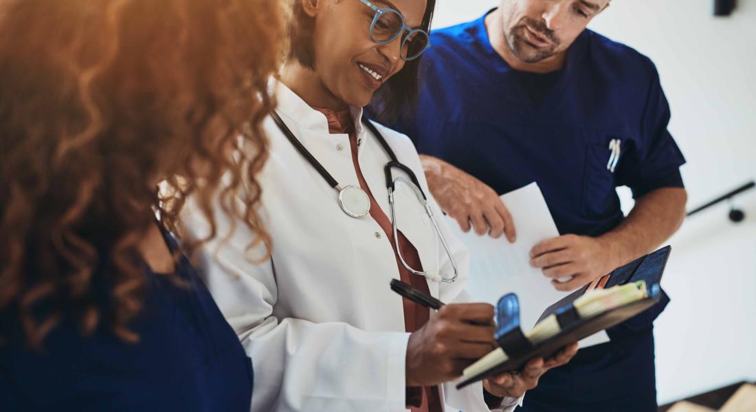 healthcare providers reviewing notes